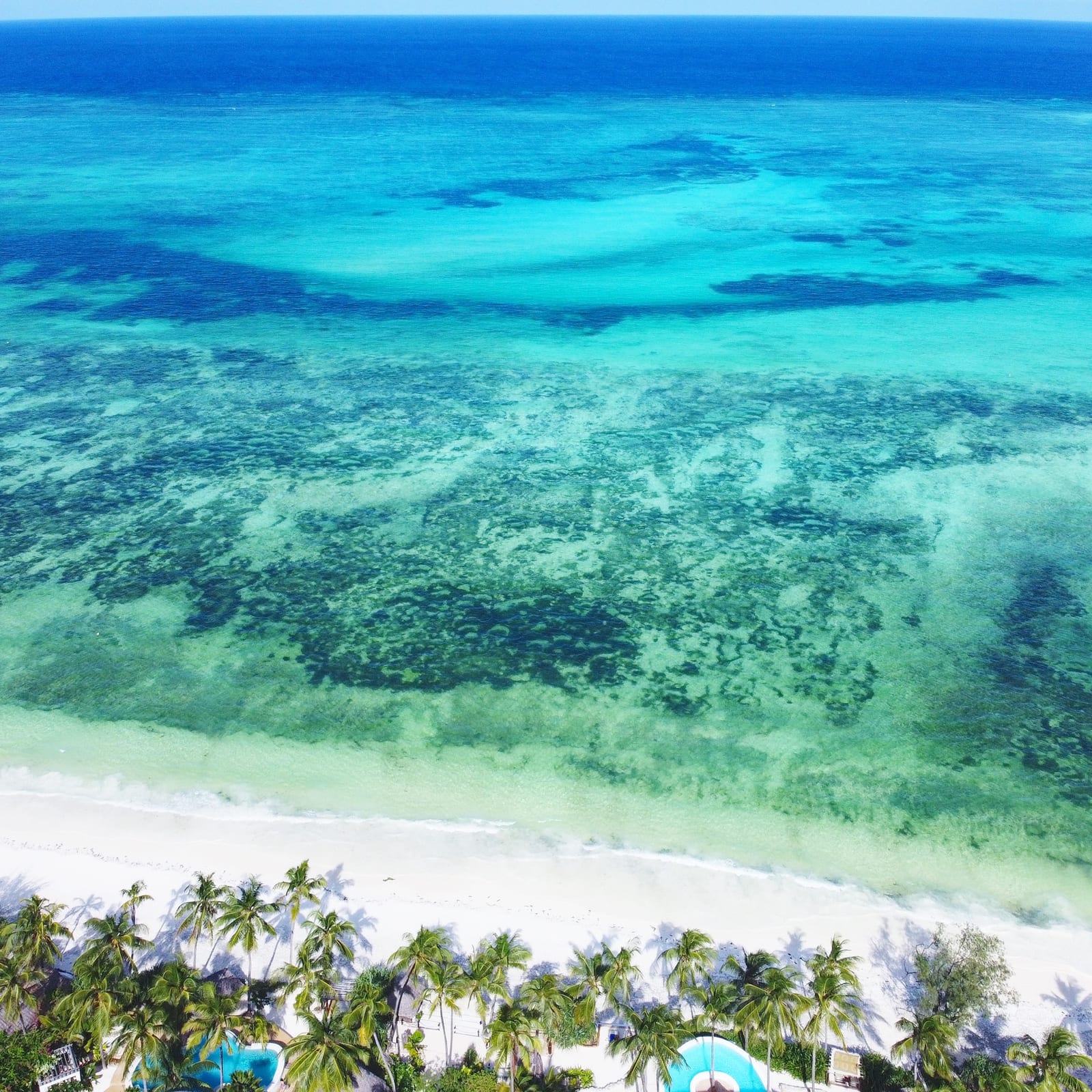 The complete Matlai property from above — two villas and the beach at Michamvi Pingwe