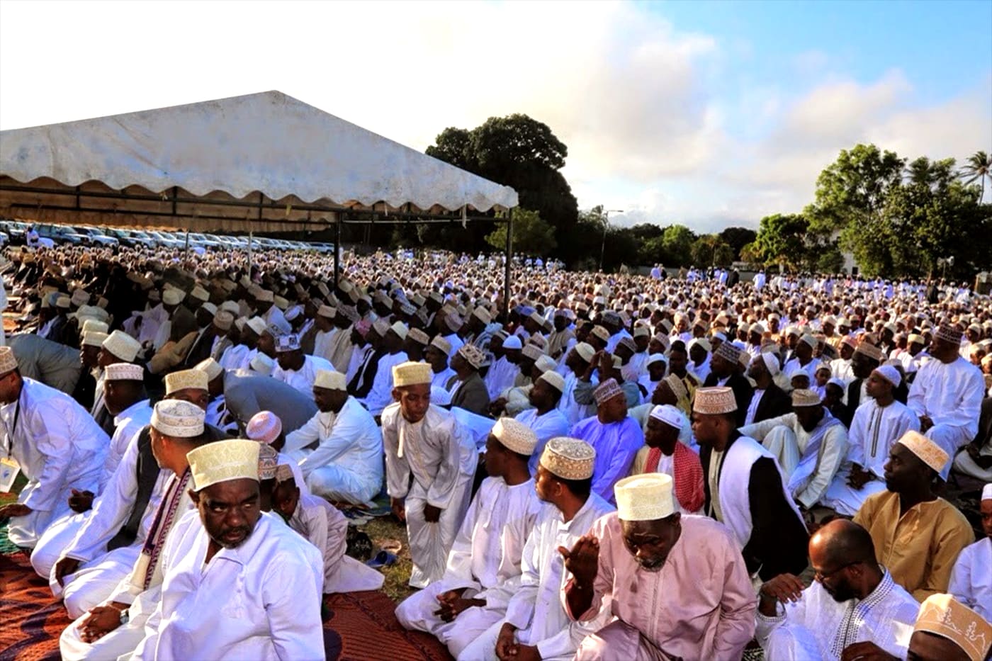 Men praying at Eid